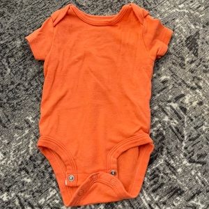 Orange body suit with matching jacket!